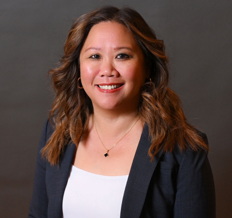 Lisa Flores headshot, smiling.